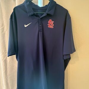 Nike Men's Navy Polo with Red Emblem